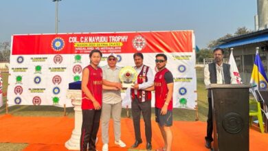 Meghalaya Cricket Association President Naba Bhattacharjee presents the BCCI Championship Trophy to Nagaland. Photo sourced
