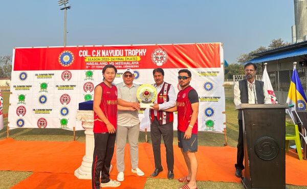 Meghalaya Cricket Association President Naba Bhattacharjee presents the BCCI Championship Trophy to Nagaland. Photo sourced