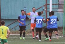 Rangdajied United goalkeeper Kerichard L Marshillong celebrates with teammates after denying a penalty by Mawlai's Brolington Warlarpih (not seen in the picture). Photo sourced
