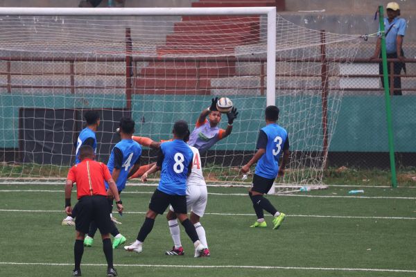Rangdajied United goalkeeper Banshanskhem tries to save Lajong's Samchaphrang Lato's (in white) shot. Photo sourced