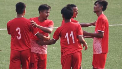 Langsning's Wilbert Marbaniang (second left) is congratulated after scoring his first goal. Photo sourced