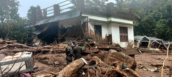 A damaged house at Mundakkai in Wayanad on Tuesday. UNI photo