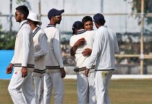 Delhi's Udhav Mohan (second right) celebrates taking the last wicket. Photo sourced