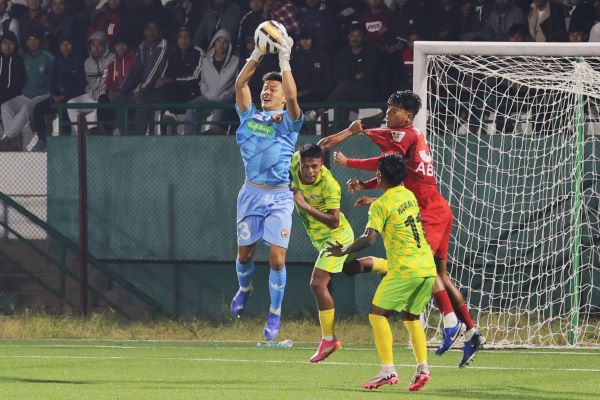 Shillong Lajong in red (goalkeeper in blue) and Mawlai in yellow. Photo sourced