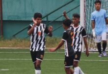 Mawlai's Khrawkupar Jana (left) is congratulated by teammates after scoring. Photo sourced