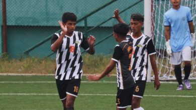 Mawlai's Khrawkupar Jana (left) is congratulated by teammates after scoring. Photo sourced