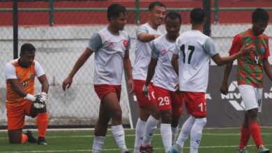 Langsning's Rhitso Mero (centre) celebrates with teammates after scoring his second goal. Photo sourced