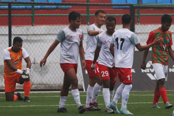 Langsning's Rhitso Mero (centre) celebrates with teammates after scoring his second goal. Photo sourced