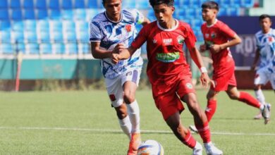 Shillong Lajong in red, Sawmer in white-blue.JPG Shillong Lajong in red, Sawmer in white-blue. Photo sourced