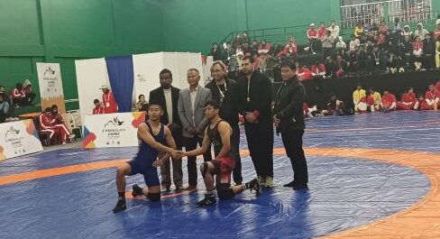 Wrestlers with the officials. Photo by MM