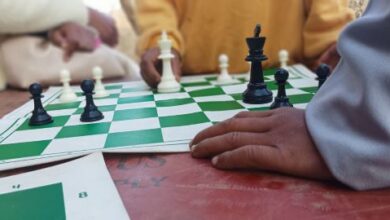 Young players at the chess booth at Shad Lyngdoh in Rangthylliang village. Photo by MM