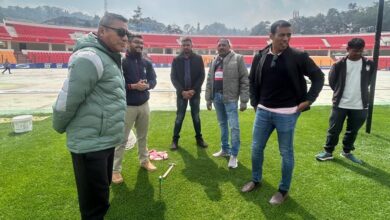 Indian senior men's football team Assistant Coach Mahesh Gawli (second right) and Meghalaya Football Association Vice-President Cliff Nongrum (left) at the JN Stadium on Tuesday. Photo sourced