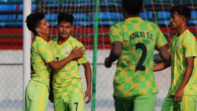 Mawlai's Kevin Rymbai (second left) is congratulated after scoring his first goal. Photo sourced