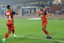 NEUFC's Asheer Akhtar celebrates with teammate Alaeddine Ajaraie after scoring. (Sourced file photo)