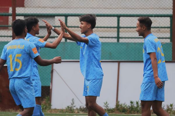 Nongrim Hills' Bankyrshan Ryndong (centre) is congratulated after scoring. Photo sourced