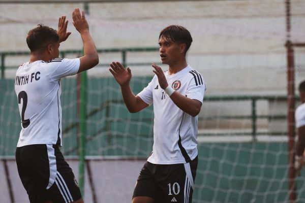 Ryntih's Andy Mawthoh (right) is congratulated after scoring his second goal. Photo sourced