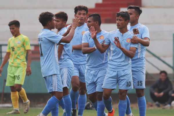 Laitkor's Sandy Kharkongor (No. 10) is congratulated after scoring. Photo sourced