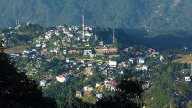 Kohima city, Nagaland. In August 2024, following rains and landslide in Kohima, the retaining wall surrounding Vejopra Dozo’s home collapsed. In May 2025, he received a payout of ₹25,000 after a visit to the District Disaster Management Cell. Image by Shyamal L. via Wikimedia Commons (CC BY-SA 4.0).