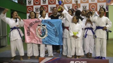Cabinet minister Paul Lyngdoh after presenting the trophy for the girls' team champions. Photo sourced