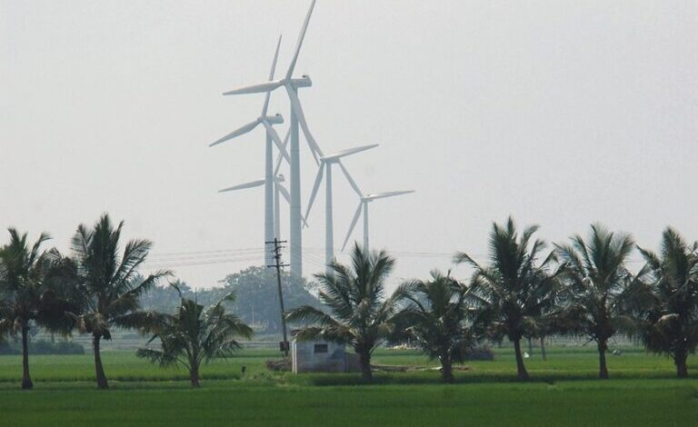 Wind turbines near paddy fields. Representative image by Yahoo! Blog via Wikimedia Commons (CC BY 2.0).