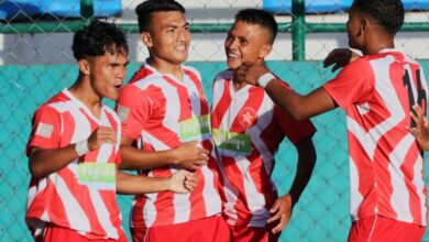 Langsning's Nelson Rymbai (second from left) celebrates with teammates after scoring. Photo sourced