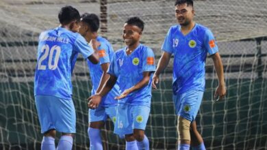 Nongrim Hills' Isharwell Mukhim (centre) is congratulated after scoring. Photo sourced