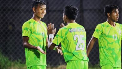 Mawlai's Loving Suting (left) is being congratulated after scoring his hat-trick. Photo sourced