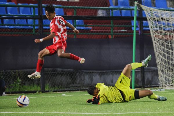 SPL 2025: Langsning's Wanshwadame Diengdoh leaps over Nangkiew Irat goalkeeper Surjay Kumar Pariyar before scoring his first goal. Photo sourced