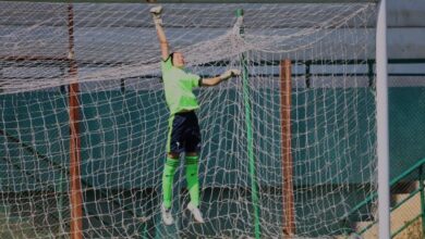 The Na Rympei goalkeeper attempts to make a save. Photo sourced