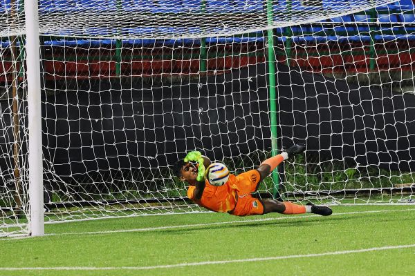 Mawlai goalkeeper Damangbha Rymbai makes a save during the penalty shootout. Photo sourced