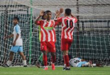 Langsning's Donlad Diengdoh (centre) is congratulated on scoring his second goal. Photo sourced