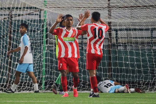 Langsning's Donlad Diengdoh (centre) is congratulated on scoring his second goal. Photo sourced