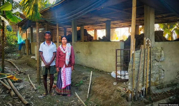 Mridul and Binita Buragohain at their pig farm in Betbari in Sivasagar district of Assam. Photo by Sanskrita Bharadwaj