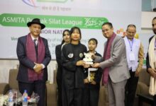 Sports and Youth Affairs Minister Wailadmiki Shylla felicitates two Meghalaya athletes. Photo sourced