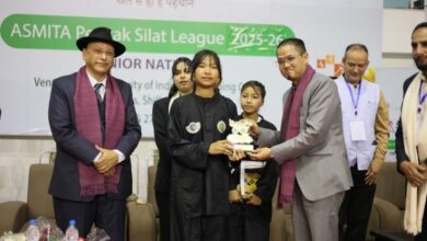 Sports and Youth Affairs Minister Wailadmiki Shylla felicitates two Meghalaya athletes. Photo sourced