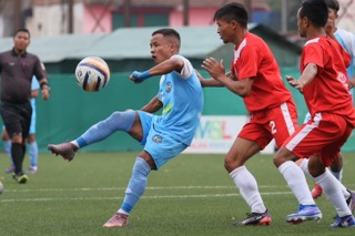 Nongkseh's Chesterpaul Lyngdoh (in blue) preparing to kick the ball. Photo sourced