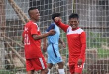 Nangkiew Irat's Dibinroy Nongspung (left) congratulatees Banshanlang Nongdhar (right) after the latter scored. Photo sourced