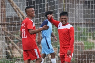 Nangkiew Irat's Dibinroy Nongspung (left) congratulatees Banshanlang Nongdhar (right) after the latter scored. Photo sourced