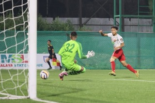 MSL5: Shillong Lajong's Fridison Wanniang watches as his shot heads towards goal. Photo sourced