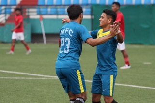 Nangkiew Irat's Neblejohn Lyngkhoi (right) is congratulated after scoring. Photo sourced