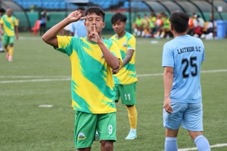 Mawlai's Fairming Suting gestures to the camera after scoring. Photo sourced