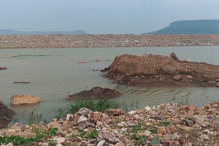 Construction material such as soil and stones placed at the Ken-Betwa link project site. Image by Satish Bharatiya/Mongabay.