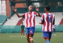 Langsning's Mebanshngain Kurkalang (left) celebrates after scoring. Photo sourced