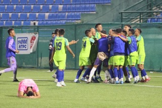 Meghalaya Police players celebrate together, Langsning's Mangkara Sun can be seen in the foreground. Photo sourced