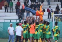 Mawlai players lift head coach Hering Shangpliang into the air after the match. Photo sourced