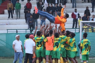 Mawlai players lift head coach Hering Shangpliang into the air after the match. Photo sourced