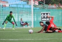 Sawmer in red (goalkeeper in green), Mylliem in black. Photo sourced