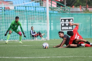 Sawmer in red (goalkeeper in green), Mylliem in black. Photo sourced